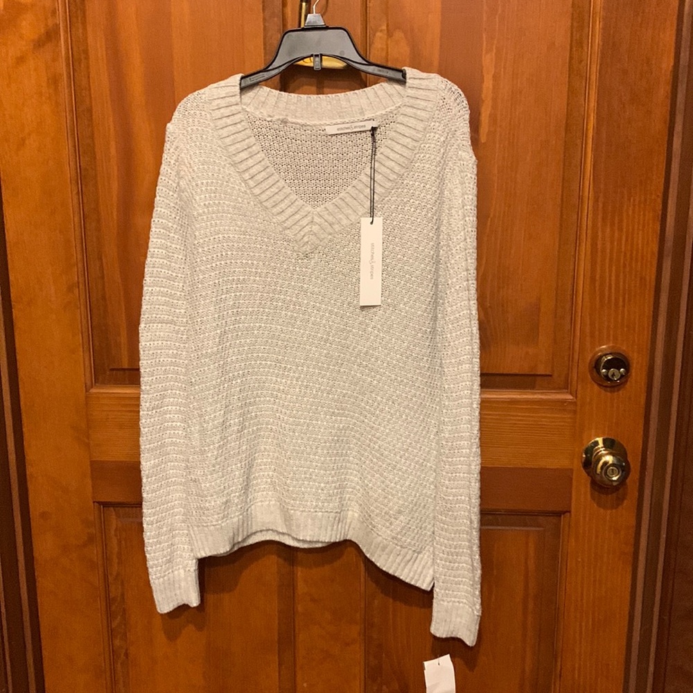 Stitches and stripes sweater